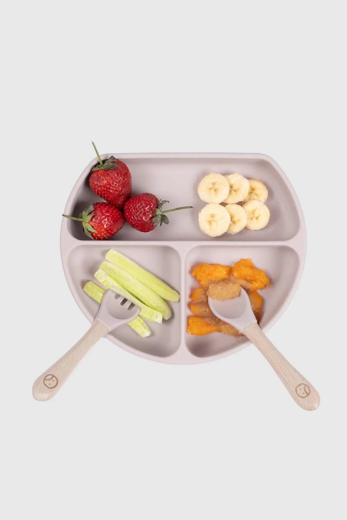 3-compartment baby feeding plate in pink with lid, featuring fruits and utensils for organized mealtime.