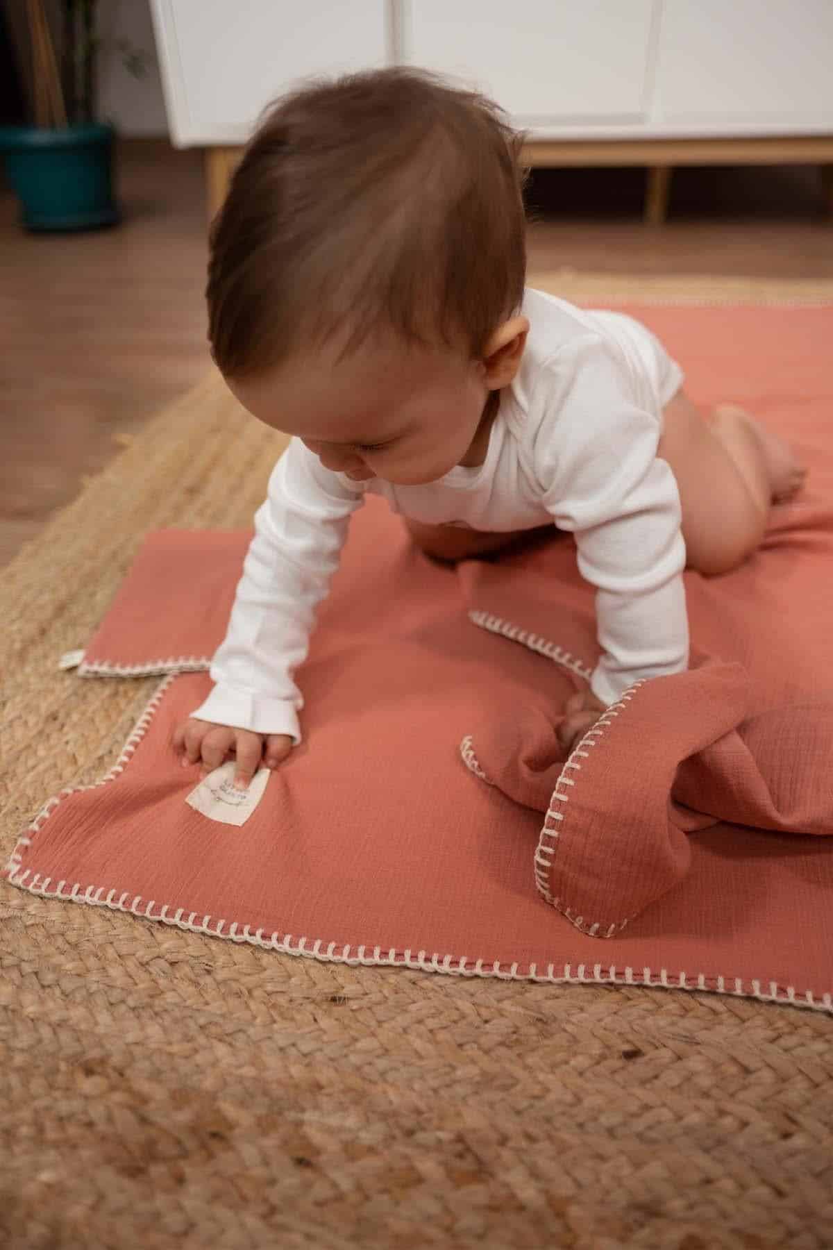 Organic Cotton Muslin Swaddle in Pink - Soft, Breathable, and Gentle