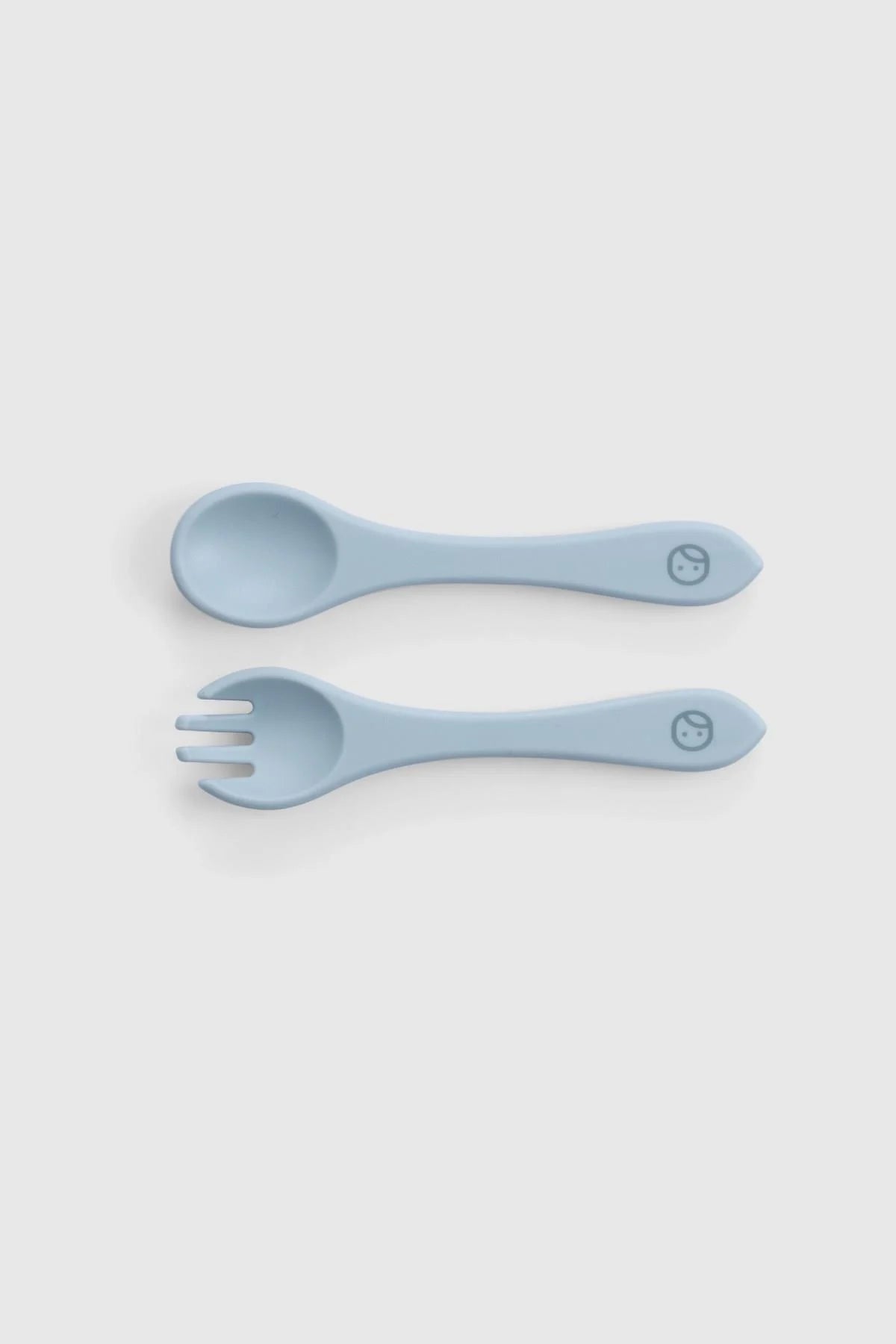 Blue silicone cutlery set featuring a spoon and fork, designed for baby's self-feeding and easy handling.