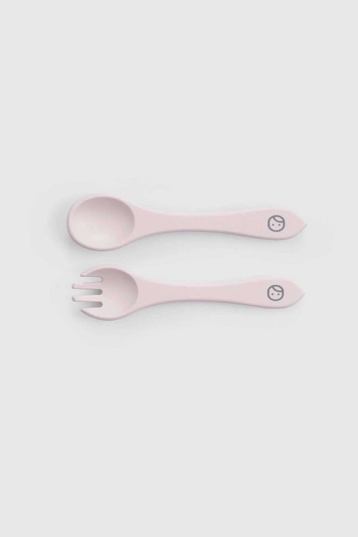 Pink silicone spoon and fork from the Silicone Vacuum Food Plate and Cutlery Set, designed for easy self-feeding.