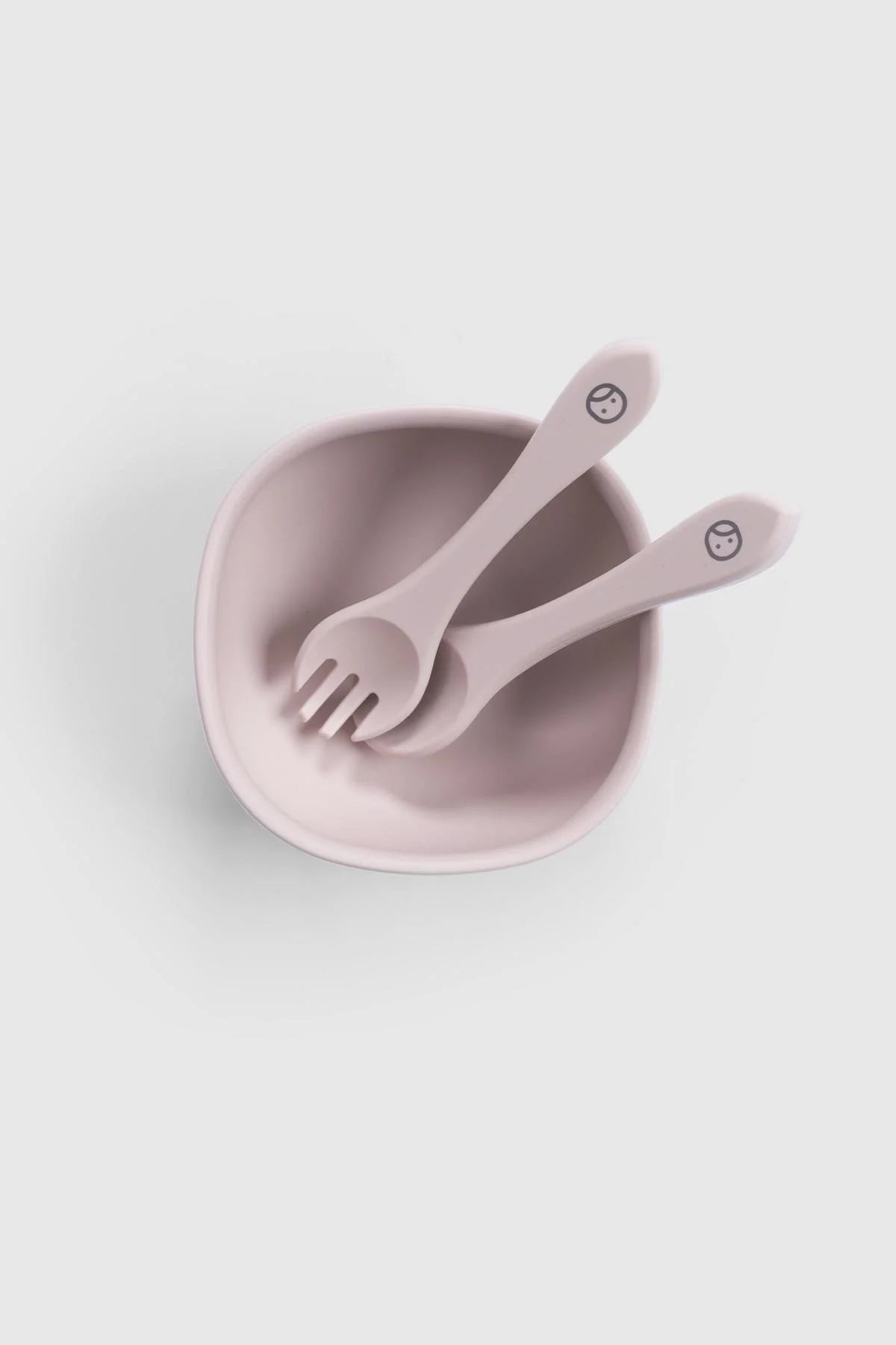 Little Gusto pink silicone vacuum food plate with cutlery set, featuring a bowl and fork/spoon duo for baby self-feeding.