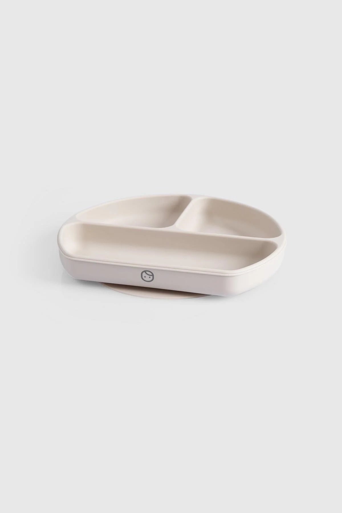 3 compartment beige baby feeding plate with lid designed for Montessori, featuring suction base for mess-free mealtimes.