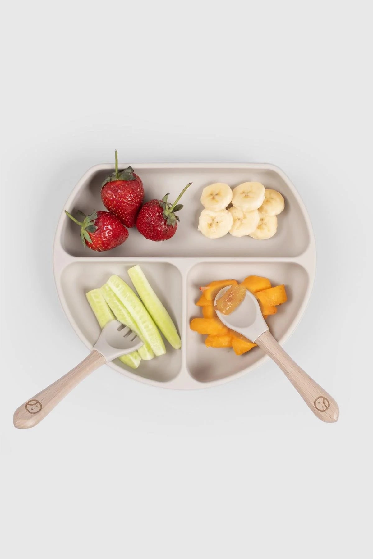 3-compartment baby feeding plate with lid, featuring strawberries, bananas, cucumber, and melon.