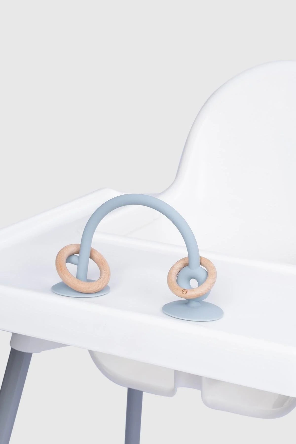 Little Gusto silicone high chair toy in blue with bamboo rings, designed for baby and toddler playtime.