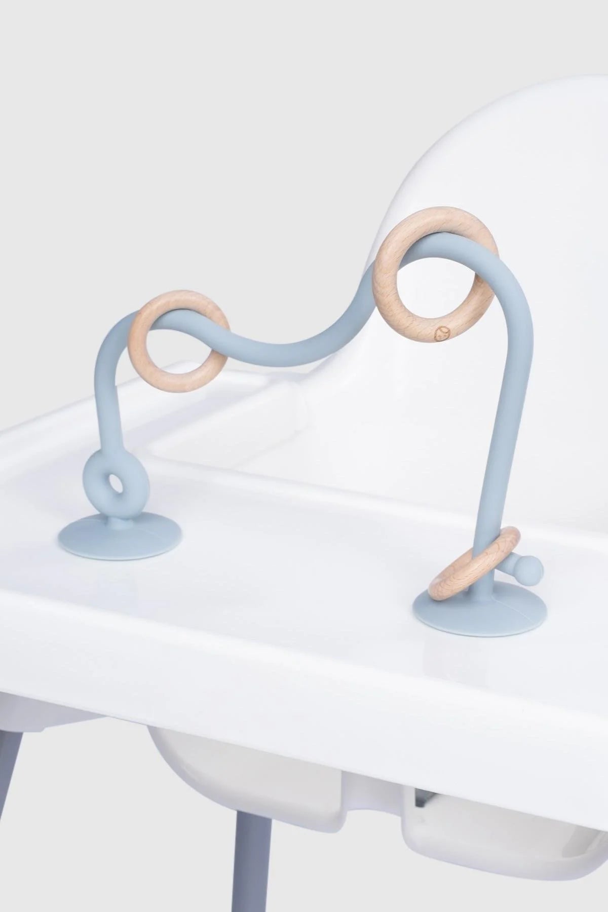 Silicone educational high chair toy in blue with bamboo accents, ideal for baby and toddler playtime.