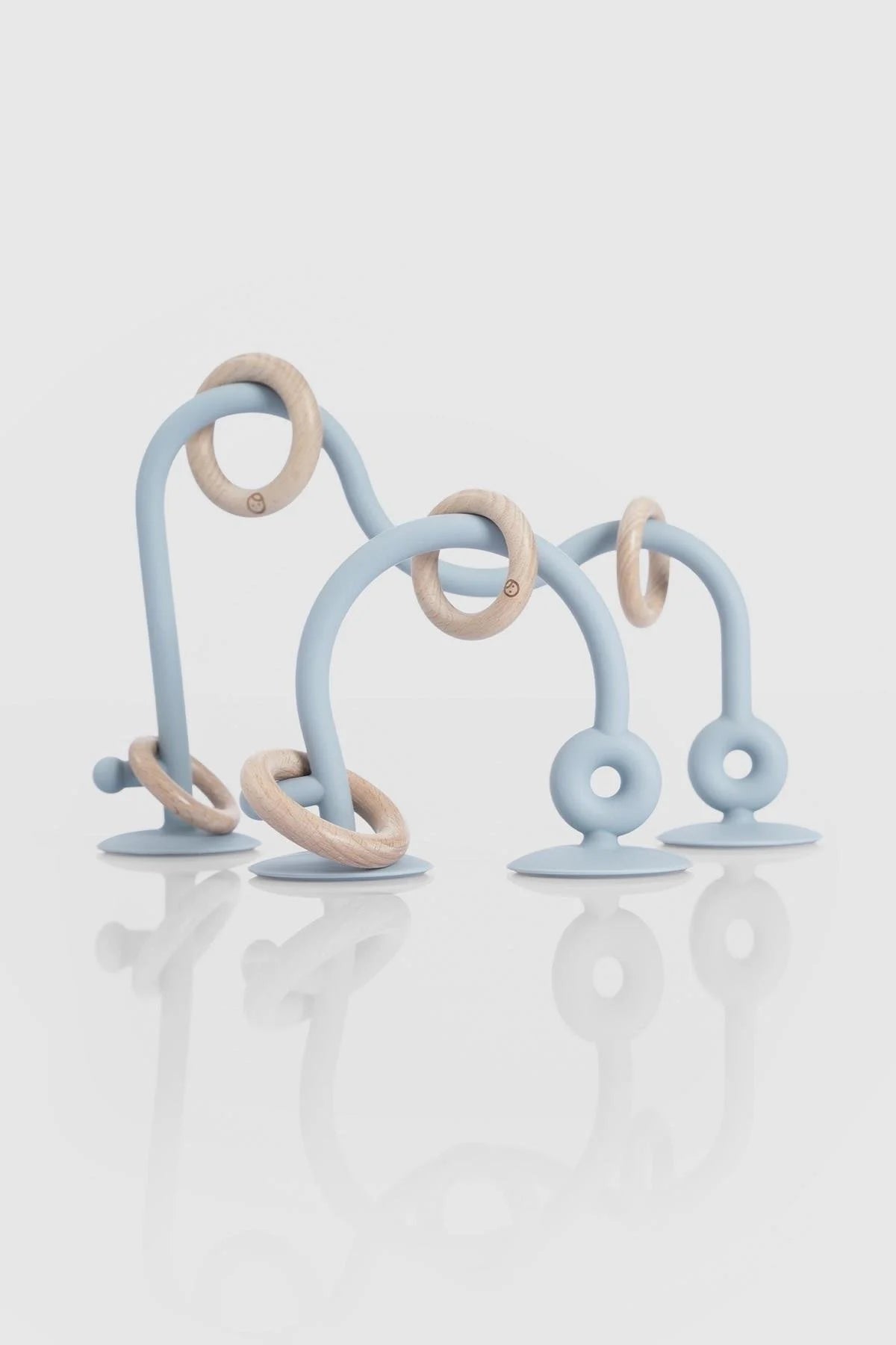 Silicone educational high chair toy in blue, designed for toddlers with suction base for secure play and learning.