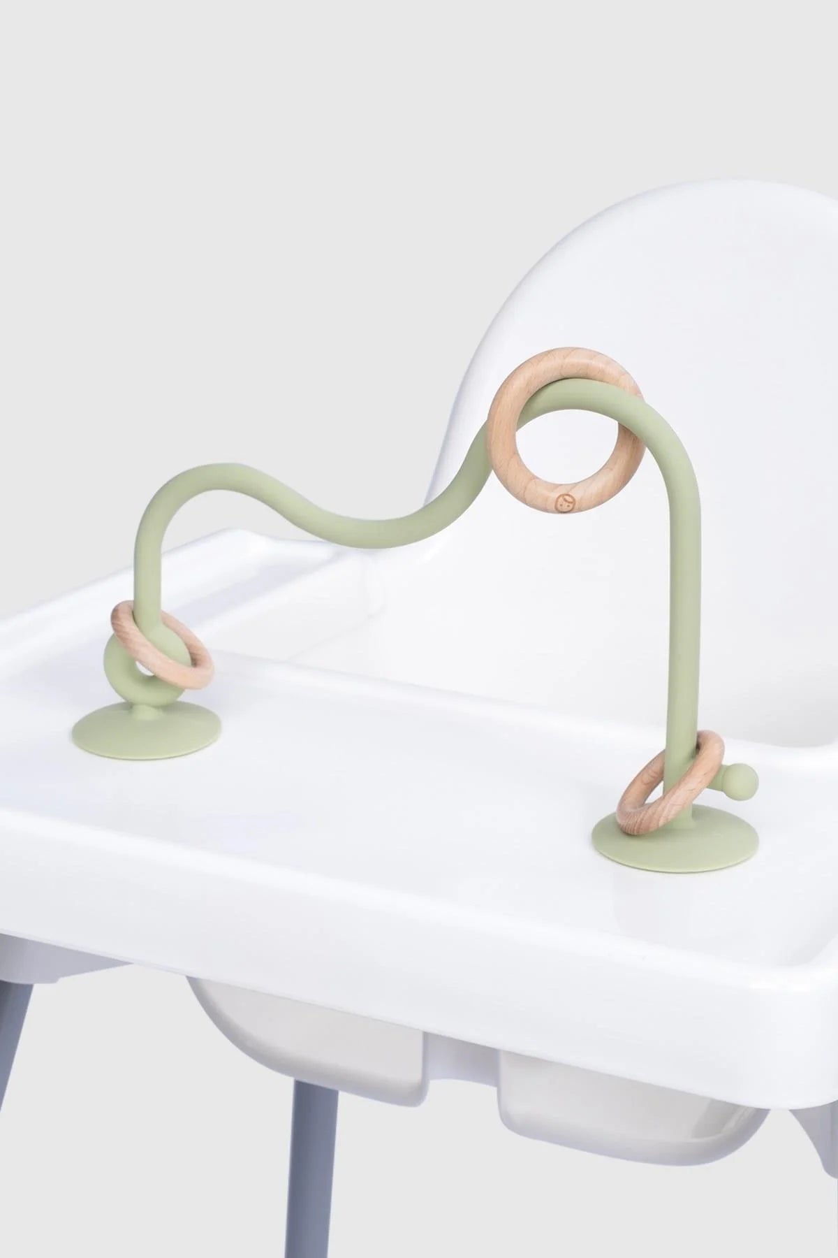 Little Gusto silicone educational high chair toy in green with suction base for baby and toddler learning play.