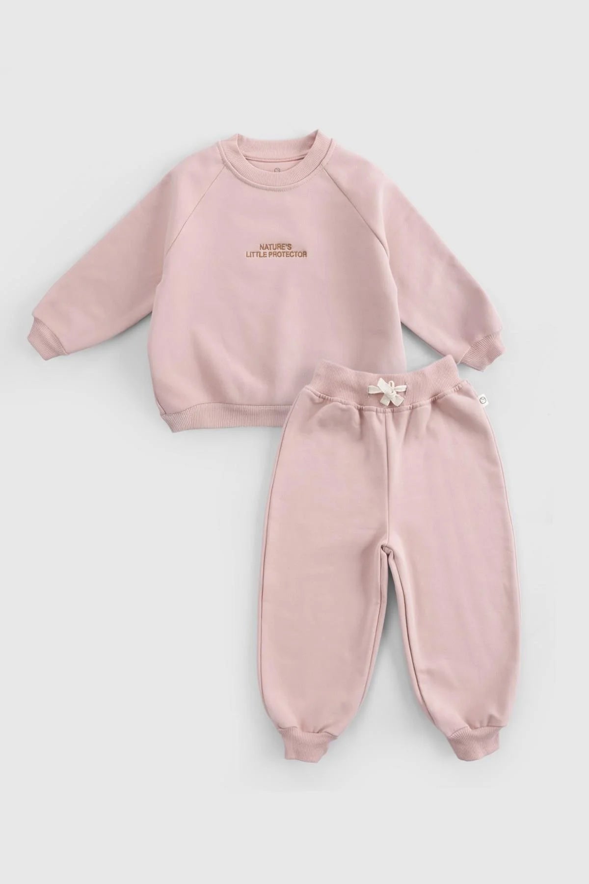 Organic cotton baby tracksuit set in pink featuring soft fabric, stylish design, and ribbed cuffs for comfort.