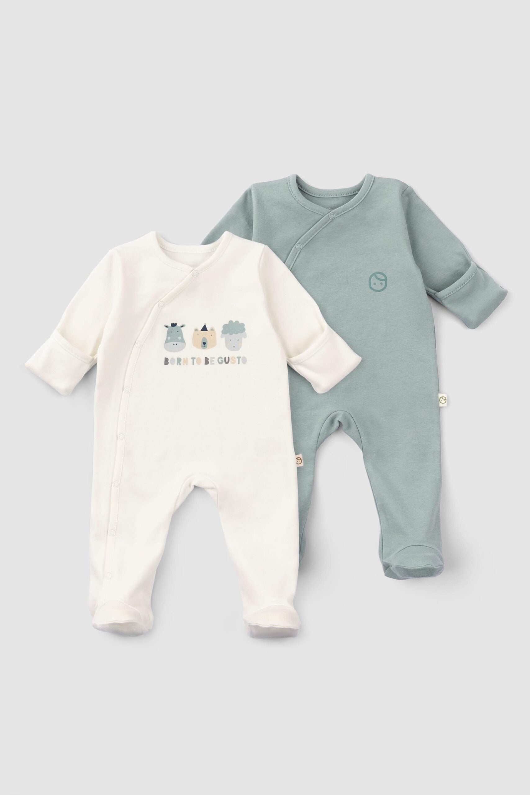 A set of two organic cotton baby onesies, one with footies and a snap button, and the other as a bodysuit with foldable mittens.