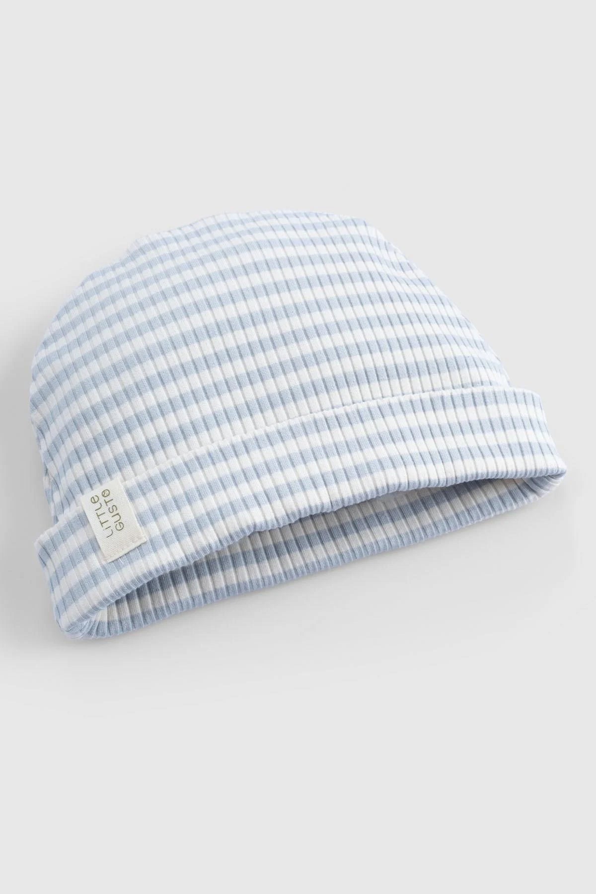 Organic cotton modal baby beanie in blue and white stripes, soft and breathable for all-day comfort.