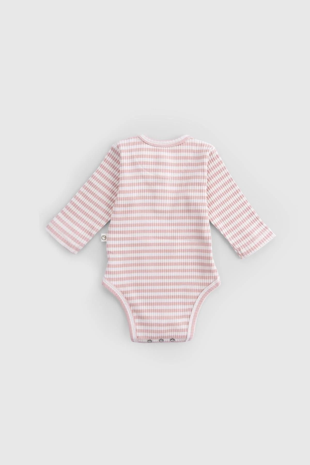 Back view of an organic cotton modal bodysuit in pink with long sleeves and snap closure for newborns.