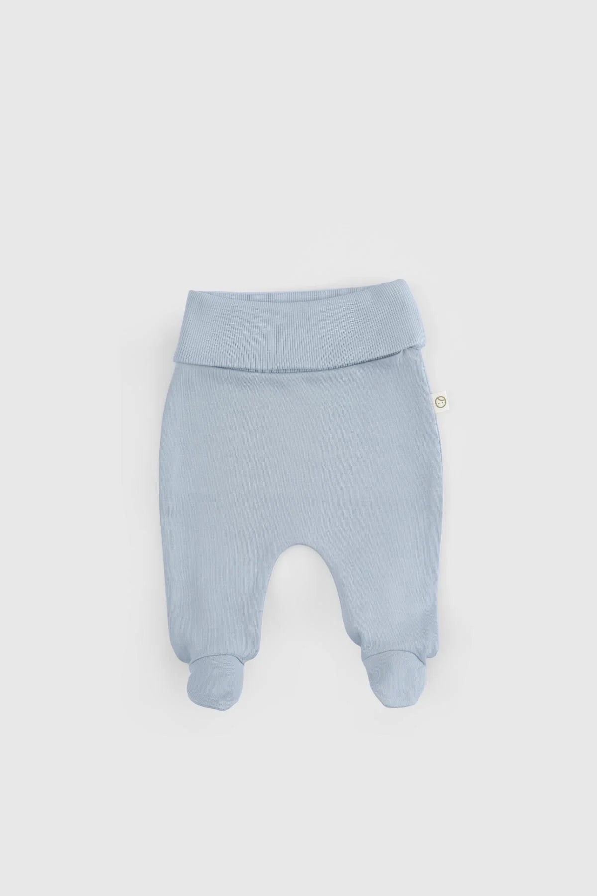 Organic cotton footed trousers in soft blue for newborns, part of the 10-piece set, GOTS certified.