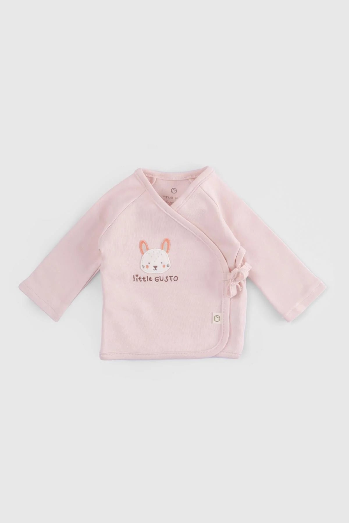 Little Gusto organic cotton kimono-style top in pink for newborns, part of a 10-piece set, breathable and soft.