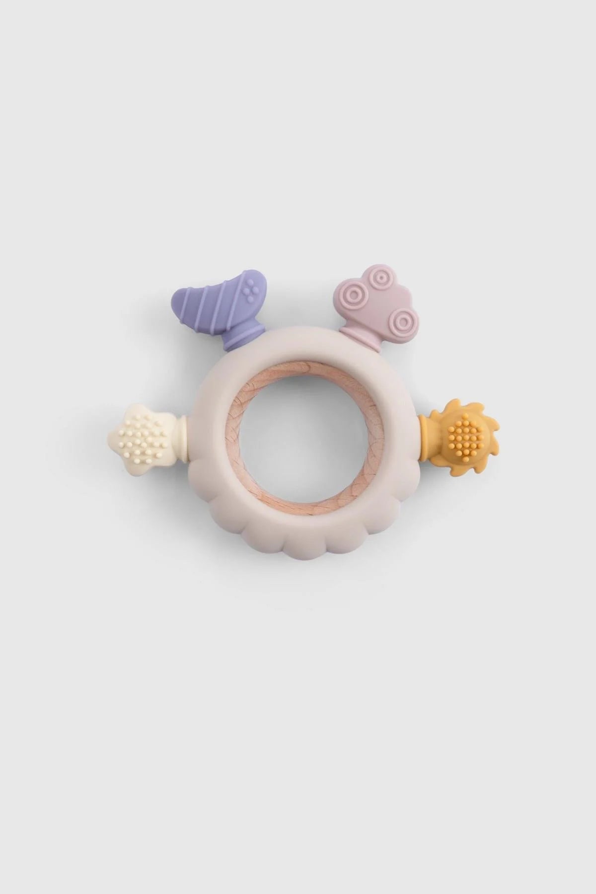 Little Gusto silicone and wooden teether with colorful shapes, designed for toddlers to soothe gums and develop motor skills.