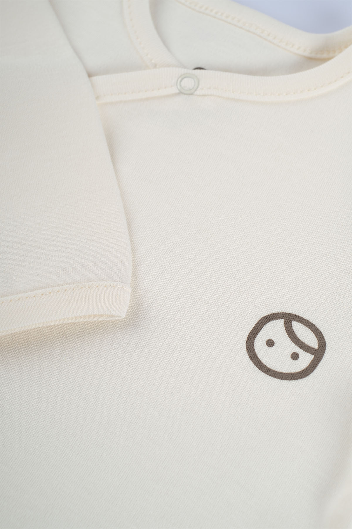 Organic Cotton Footed Onesie - Cream | Soft, Breathable, and Easy to Wear