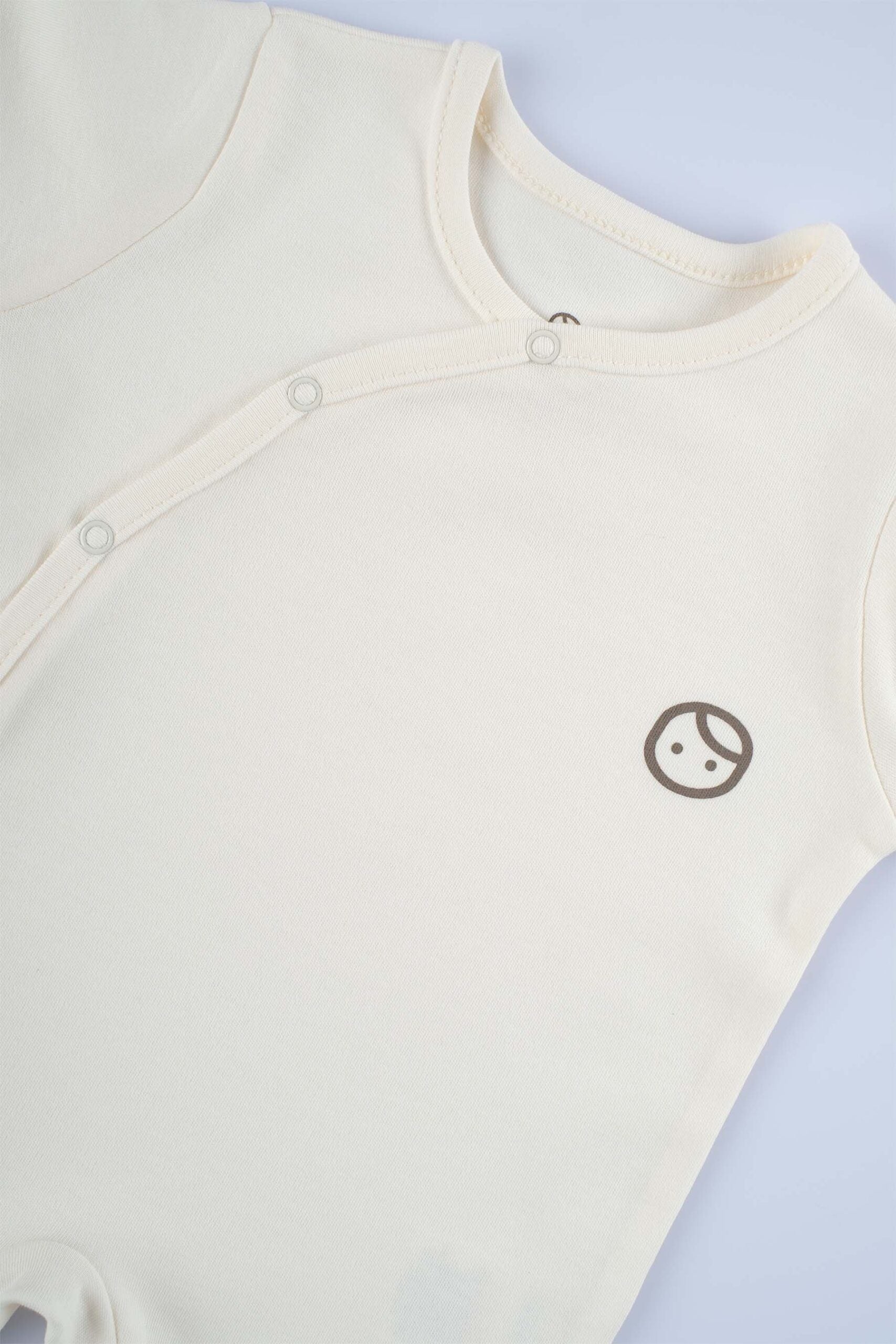 Organic Cotton Footed Onesie - Cream | Soft, Breathable, and Easy to Wear