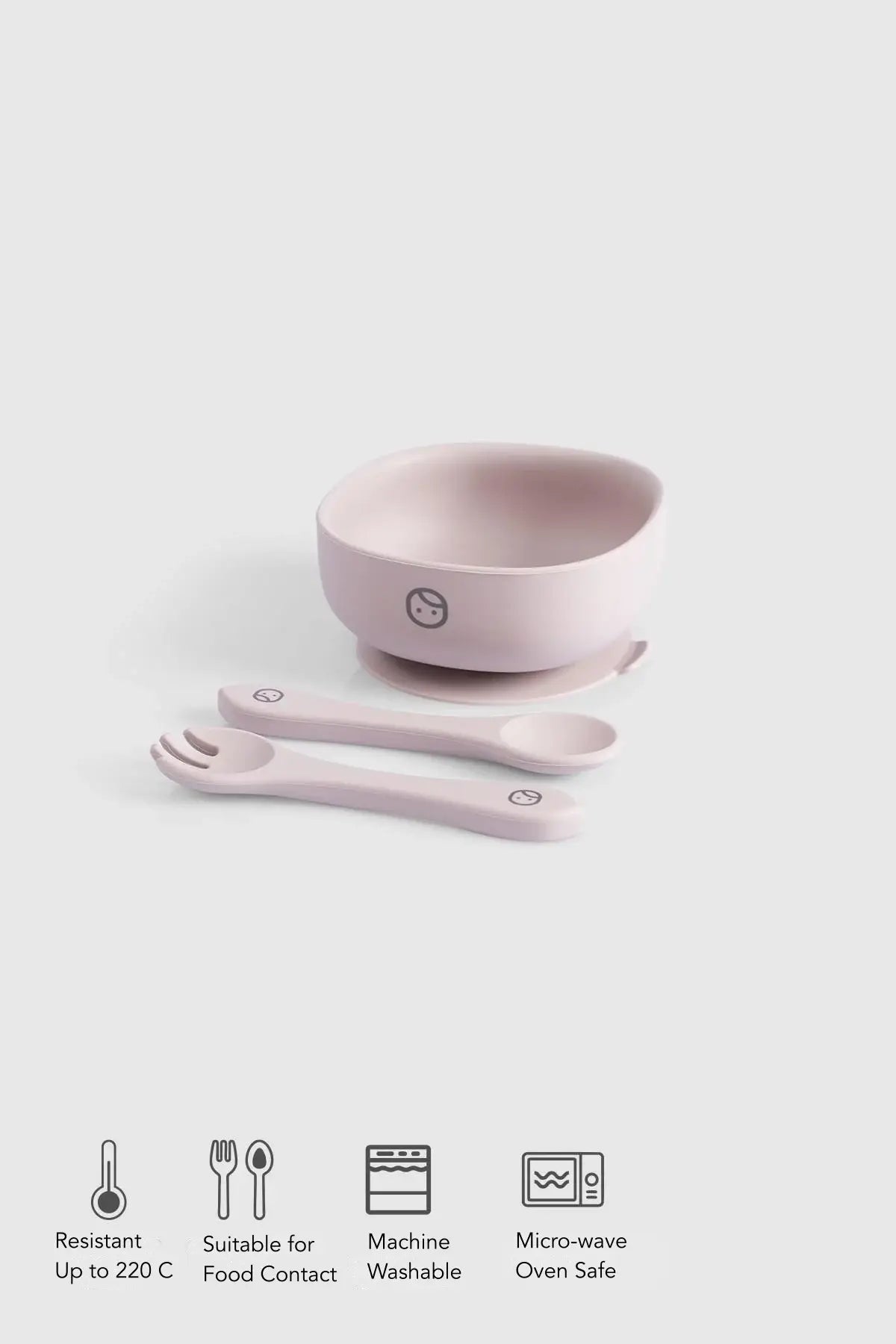 Silicone vacuum food plate and cutlery set in pink, including a bowl, fork, and spoon for easy mealtime.