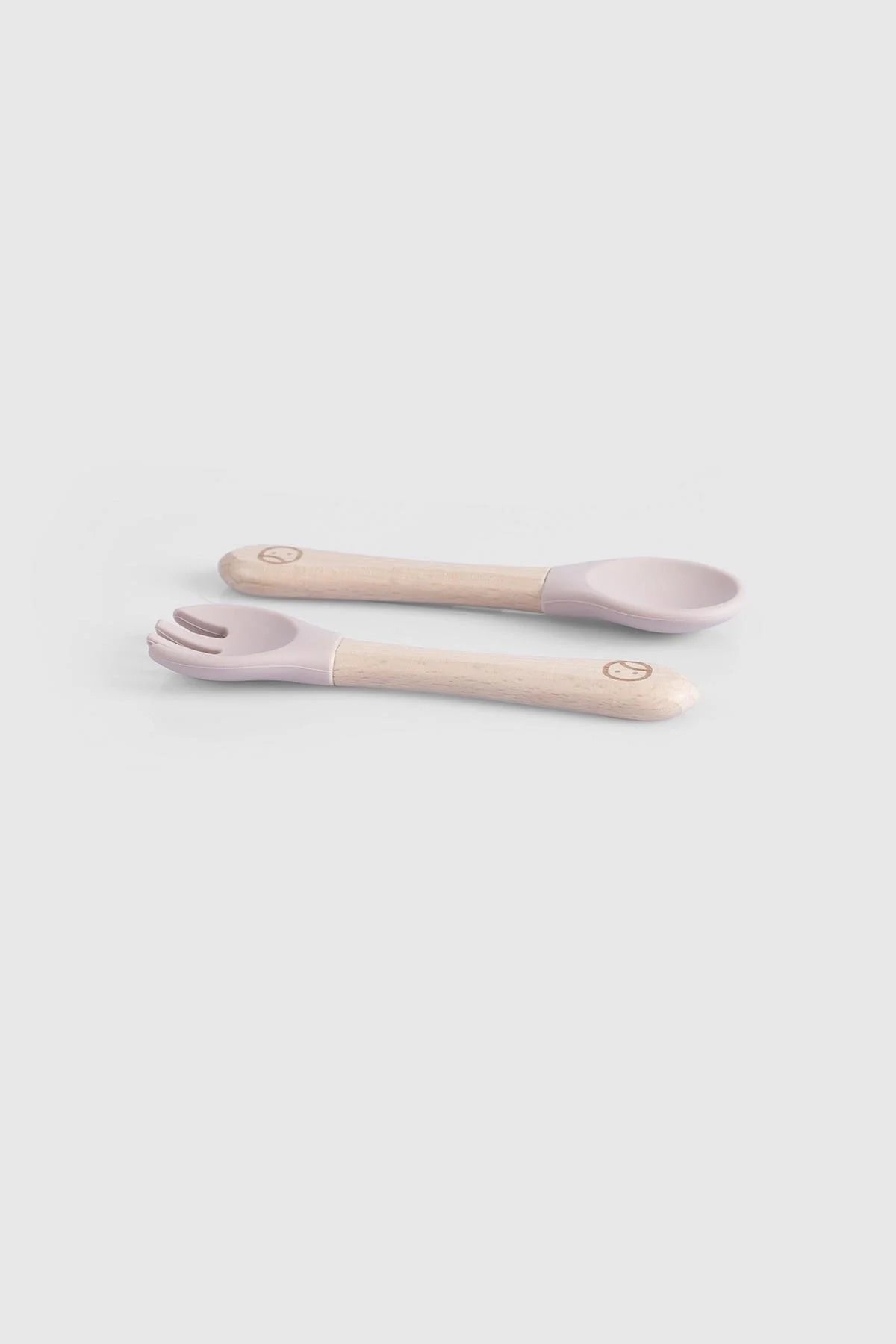 Baby cutlery set with bamboo handles in pink, perfect for newborn feeding, silicone tips, and BPA-free design.