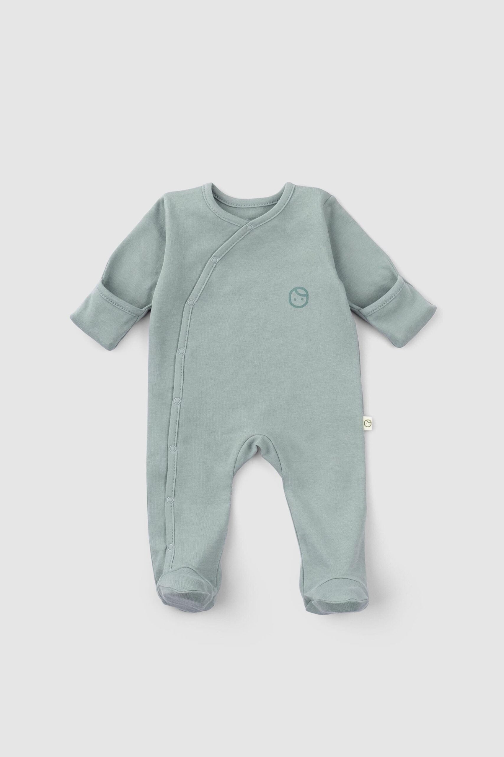 A set of two organic cotton baby onesies, one with footies and a snap button, and the other as a bodysuit with foldable mittens.