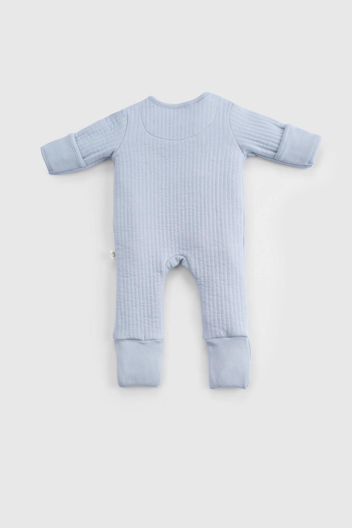 Back view of organic cotton quilted sleepsuit in blue for babies, featuring soft quilted padding and warm design.