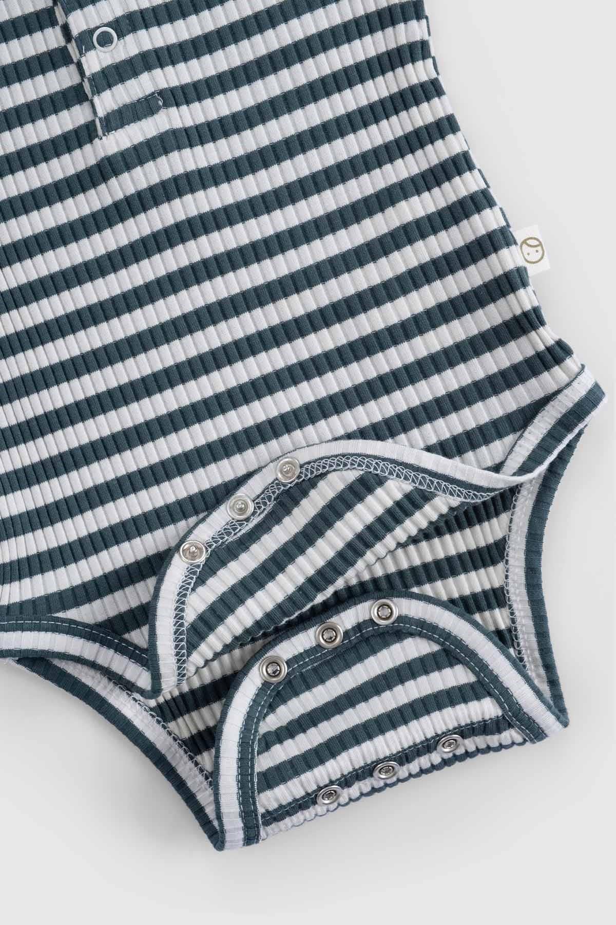 Organic cotton modal bodysuit in green and white stripes with snap closures for easy dressing.