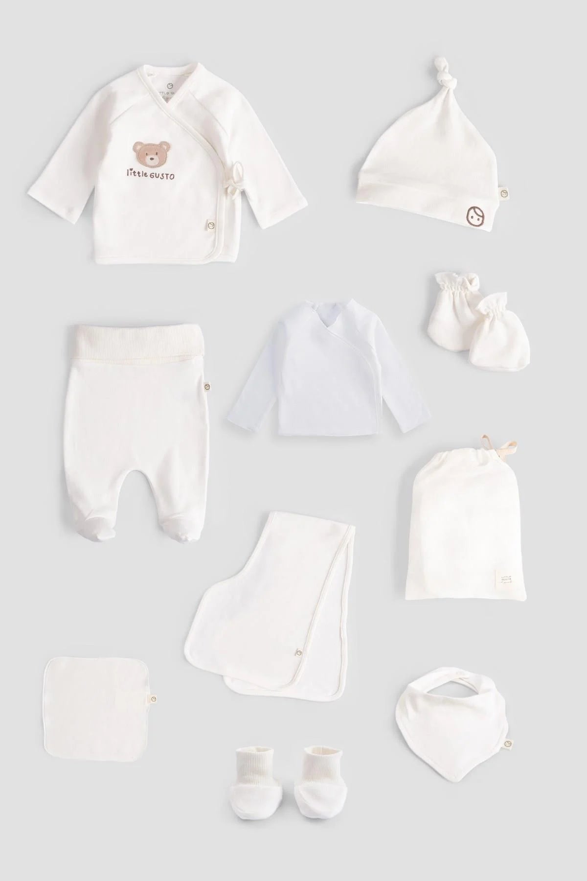 Organic Cotton Bear Newborn Set - White, 10 piece set for babies, including bodysuit, trousers, hat, and more.