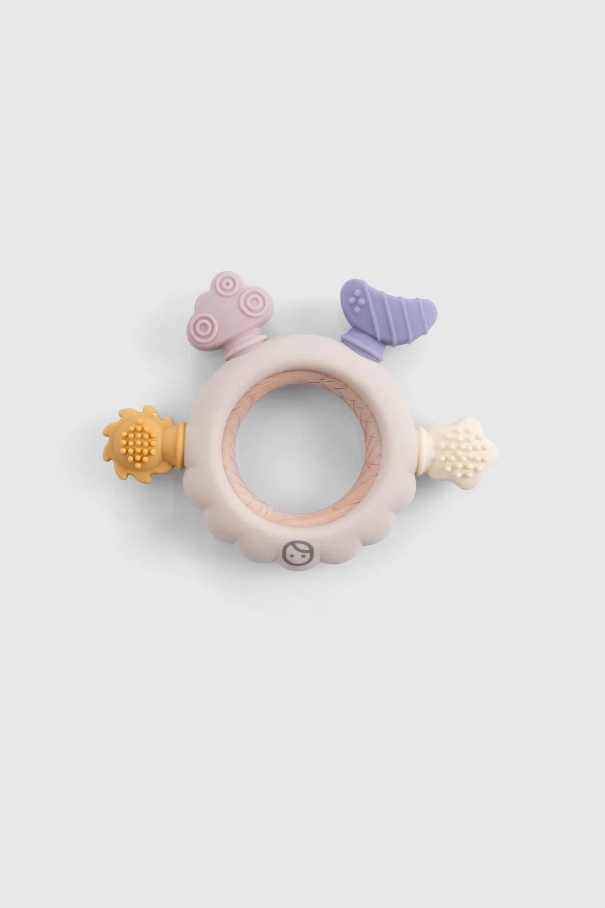 Colorful Little Gusto silicone and wooden teether designed for toddlers, promotes sensory exploration and gum relief.